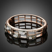 Close up detail of KHAISTA geometric designer crystal bangle