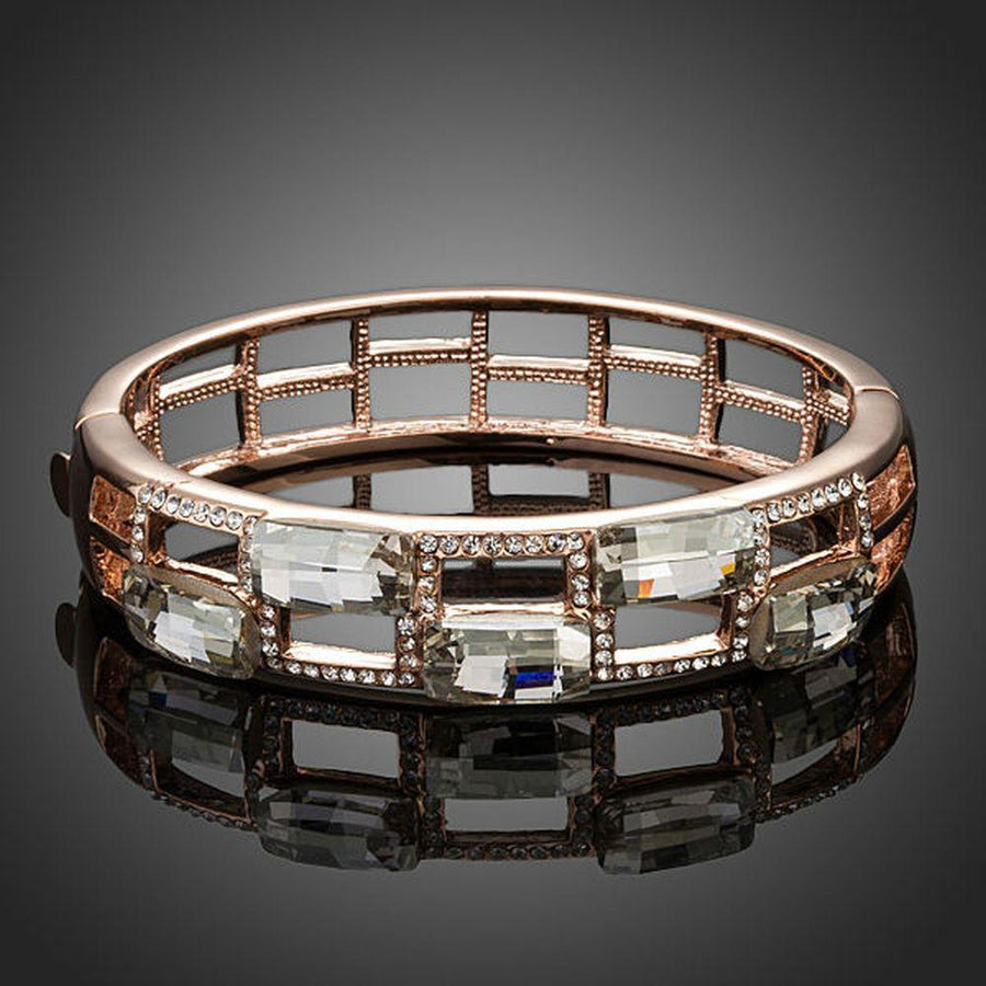 KHAISTA geometric designer crystal bangle on white background
