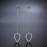 geometric long drop earrings detail view by KHAISTA