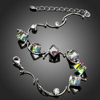 Close up detail of KHAISTA geometric colour change twisted bracelet