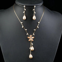 Close-up of pearl and CZ stones on Khaista gold set