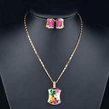 Load image into Gallery viewer, Gold Plated Artistic Clip Earrings and Pendant Necklace Set - KHAISTA Fashion Jewellery
