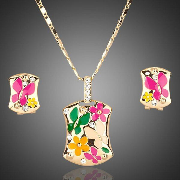 Khaista gold plated artistic crystal clip earrings pendant set