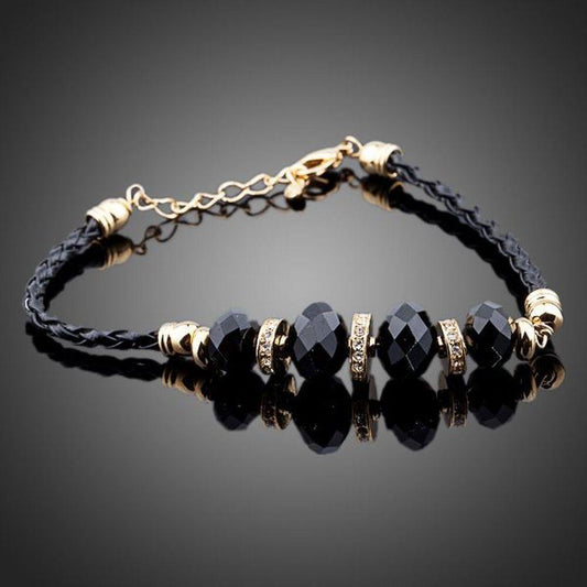 khaista gold plated black crystal charm bracelet mbr0039 image 1