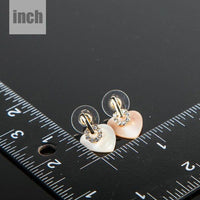gold plated light peach crystal heart earrings detail view by KHAISTA