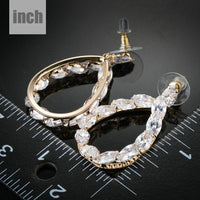 gold plated CZ chain drop earrings detail view by KHAISTA