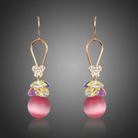 KHAISTA gold plated gradient pink drop earrings on white background