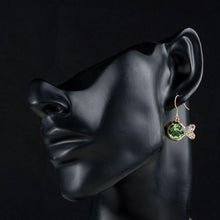 Load image into Gallery viewer, Gold Plated Green Crystal Fish Drop Earrings - KHAISTA Fashion Jewellery
