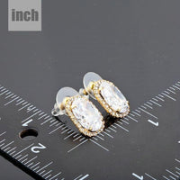 gold plated oval stud earrings detail view by KHAISTA