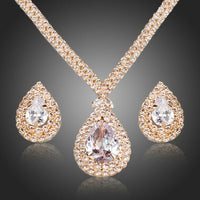 Khaista gold plated CZ waterdrop jewellery set on white background