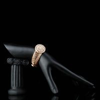 Close up detail of KHAISTA gold crystal hollow circle bangle