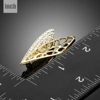 Close-up of diamante on Khaista gold wing brooch