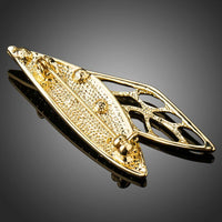 Wing design detail on Khaista gold diamante brooch