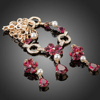 Side angle view of Khaista gold garnet CZ set