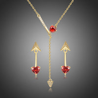 Khaista gold red cubic zirconia heart jewellery set on white background