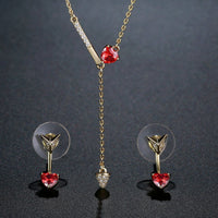 Close-up of red heart cubic zirconia on Khaista gold set