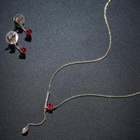 Heart cut detail on Khaista gold red CZ set