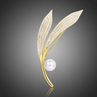 Close-up of pearl on Khaista gold leaf branch brooch