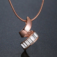 Pendant detail on KHAISTA gold paved clear CZ necklace