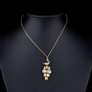 Golden Peacock Train Pendant Necklace KPN0059 - KHAISTA Fashion Jewellery