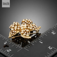 Pearl flower detail on Khaista gold brooch