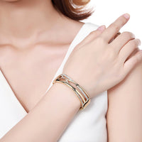 Close up detail of KHAISTA gold reflexions crystal bangle