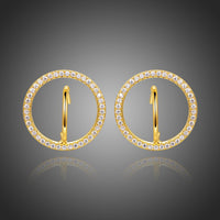 KHAISTA golden round crystal stud earrings on white background