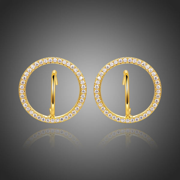 KHAISTA golden round crystal stud earrings on white background