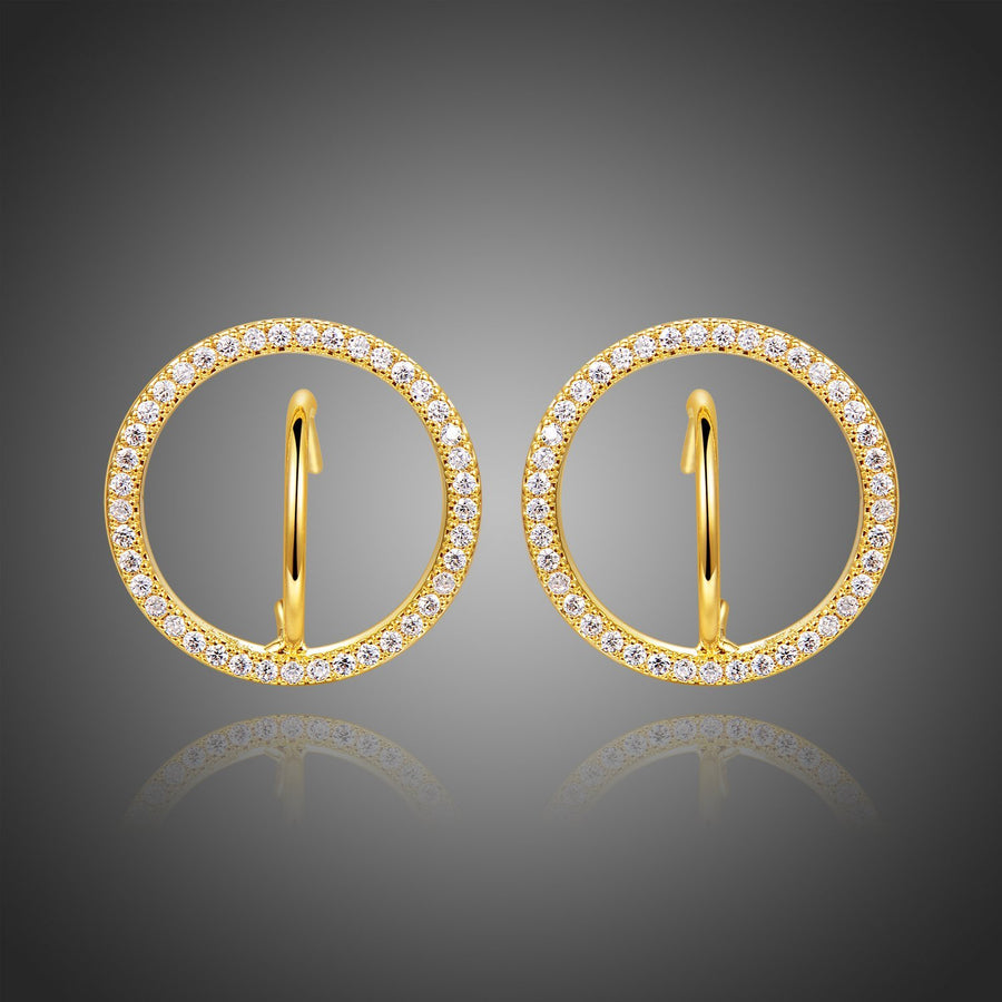 KHAISTA golden round crystal stud earrings on white background