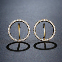 golden round crystal stud earrings detail view by KHAISTA