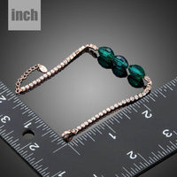 green crystal link chain bracelet detail view by KHAISTA
