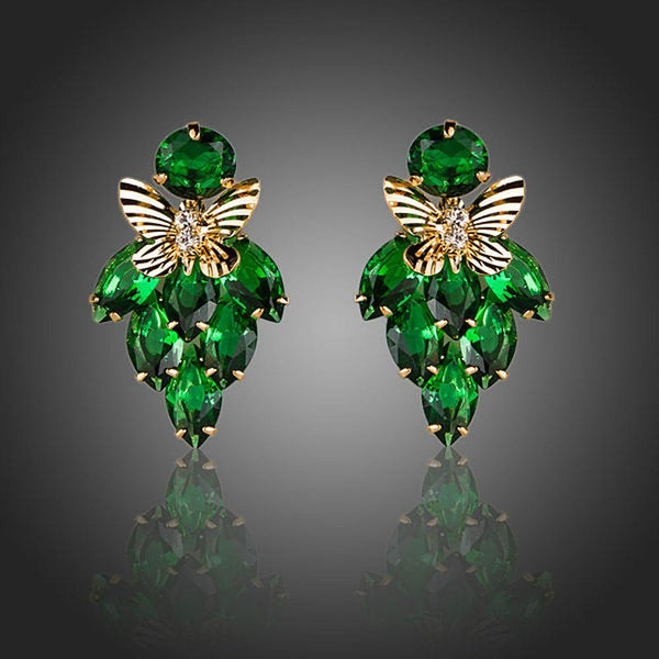 KHAISTA green CZ butterfly drop earrings on white background