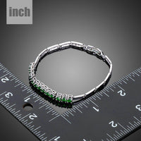 green CZ link chain bracelet detail view by KHAISTA