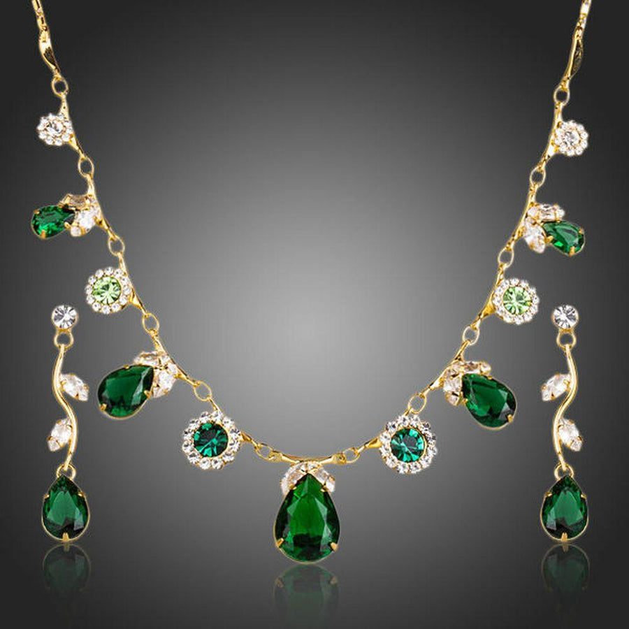 Khaista green cubic zirconia necklace earrings set on white background