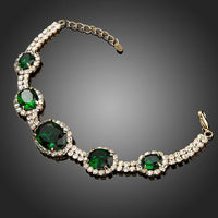 Close up detail of KHAISTA green geometric oval cut bracelet