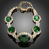 KHAISTA green geometric oval cut bracelet on white background