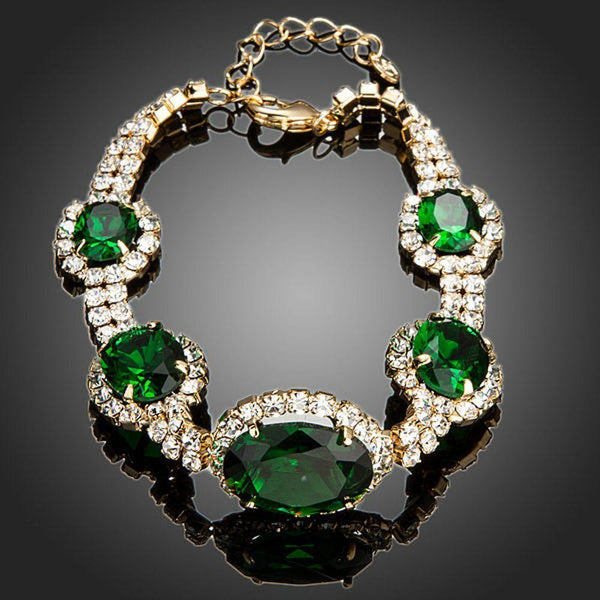 KHAISTA green geometric oval cut bracelet on white background
