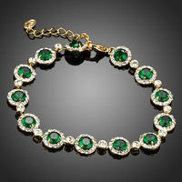 KHAISTA green glam CZ bracelet on white background