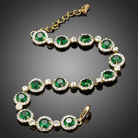 Close up detail of KHAISTA green glam CZ bracelet