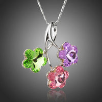 KHAISTA green pink purple flower pendant necklace on white background