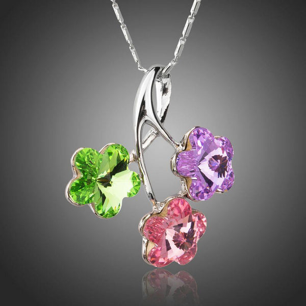 KHAISTA green pink purple flower pendant necklace on white background