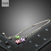 Pendant detail on KHAISTA green pink purple flower pendant necklace