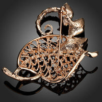Close-up of green leaf detail on Khaista brooch