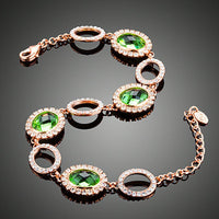 Close up detail of KHAISTA green stone designer bracelet