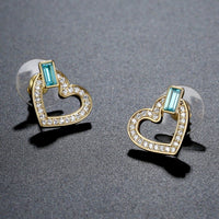 blue Austrian crystal heart stud earrings detail view by KHAISTA