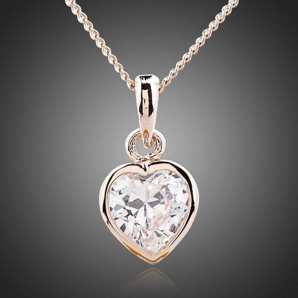 KHAISTA crystal heart pendant necklace on white background