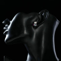 Side angle view of KHAISTA heart cube circle crystal stud earrings