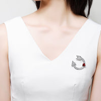 Close-up of red CZ on Khaista heart arrow brooch