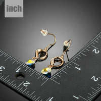 gradual change heart dangle drop earrings detail view by KHAISTA