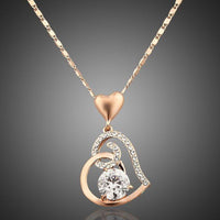 KHAISTA heart shaped snake chain crystal necklace on white background
